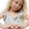 Abito con volant e stampa floreale per bambina Abito con volant e stampa floreale per bambina