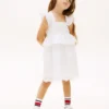 Abito da bambina con volant e ricami Abito da bambina con volant e ricami