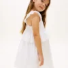 Abito da bambina con volant e ricami Abito da bambina con volant e ricami