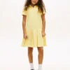 Abito polo elasticizzato a pieghe per bambina Abito polo elasticizzato a pieghe per bambina