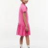 Abito polo elasticizzato a pieghe per bambina Abito polo elasticizzato a pieghe per bambina