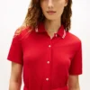 Abito polo midi con cintura e bordi a contrasto Abito polo midi con cintura e bordi a contrasto
