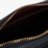 Borsa a tracolla con monogramma goffrato su tutta la superficie Borsa a tracolla con monogramma goffrato su tutta la superficie
