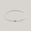 Bracciale con perline metalliche a righe Bracciale con perline metalliche a righe