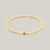 Bracciale con perline metalliche a righe