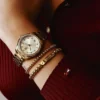 Bracciale con perline metalliche a righe