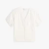 Camicia con scollo a V e ricami a occhielli Camicia con scollo a V e ricami a occhielli