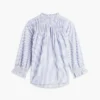 Camicia in voile con pieghe e bordi arricciati Camicia in voile con pieghe e bordi arricciati