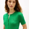 Cardigan a maniche corte con lavorazione a trecce Cardigan a maniche corte con lavorazione a trecce