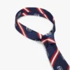 Cravatta in seta a righe con monogramma su tutta la superficie