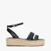 Espadrillas con plateau e cinturini intrecciati in pelle Espadrillas con plateau e cinturini intrecciati in pelle