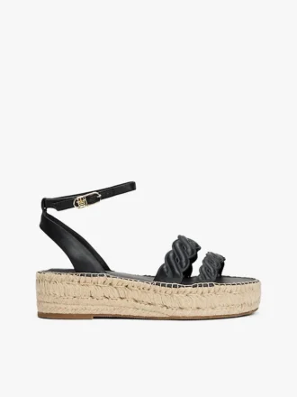 Espadrillas con plateau e cinturini intrecciati in pelle