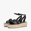 Espadrillas con plateau e cinturini intrecciati in pelle Espadrillas con plateau e cinturini intrecciati in pelle