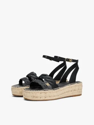 Espadrillas con plateau e cinturini intrecciati in pelle