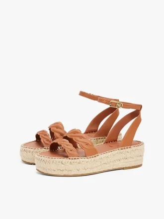 Espadrillas con plateau e cinturini intrecciati in pelle