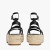 Espadrillas con plateau e cinturini intrecciati in pelle Espadrillas con plateau e cinturini intrecciati in pelle