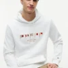 Felpa con cappuccio e bandiere nautiche ricamate