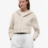 Felpa con cappuccio e zip dal taglio comodo Felpa con cappuccio e zip dal taglio comodo