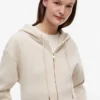 Felpa con cappuccio e zip dal taglio comodo Felpa con cappuccio e zip dal taglio comodo