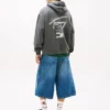 Felpa con cappuccio Tommy Jeans con logo verniciato a spruzzo Felpa con cappuccio Tommy Jeans con logo verniciato a spruzzo
