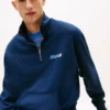 Felpa con logo Tommy Jeans e zip a un quarto Felpa con logo Tommy Jeans e zip a un quarto