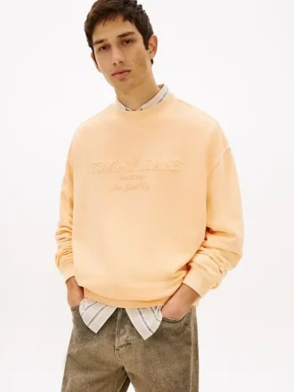 Felpa con logo Tommy Jeans tinta in capo