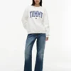 Felpa girocollo con logo Tommy in stile college Felpa girocollo con logo Tommy in stile college
