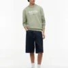 Felpa in pelle scamosciata con logo Tommy Jeans Felpa in pelle scamosciata con logo Tommy Jeans
