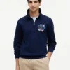 Felpa polo con logo floreale e zip a un quarto Felpa polo con logo floreale e zip a un quarto