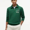 Felpa polo con logo floreale e zip a un quarto Felpa polo con logo floreale e zip a un quarto