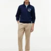 Felpa polo con logo floreale e zip a un quarto Felpa polo con logo floreale e zip a un quarto