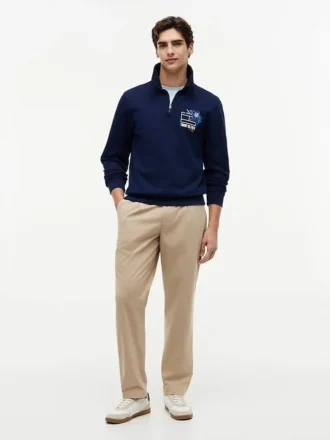 Felpa polo con logo floreale e zip a un quarto