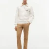 Felpa polo con logo floreale e zip a un quarto Felpa polo con logo floreale e zip a un quarto