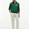 Felpa polo con logo floreale e zip a un quarto Felpa polo con logo floreale e zip a un quarto