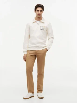 Felpa polo con logo floreale e zip a un quarto
