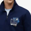 Felpa polo con logo floreale e zip a un quarto Felpa polo con logo floreale e zip a un quarto