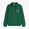 Felpa polo con logo floreale e zip a un quarto Felpa polo con logo floreale e zip a un quarto