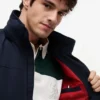 Giacca Regatta con cappuccio idrorepellente Giacca Regatta con cappuccio idrorepellente