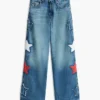 Jeans a vita alta a gamba larga con motivo a stelle per bambina Jeans a vita alta a gamba larga con motivo a stelle per bambina