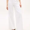 Jeans a vita alta con orlo grezzo e gamba larga