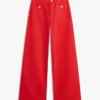 Jeans a vita alta con orlo grezzo e gamba larga Jeans a vita alta con orlo grezzo e gamba larga