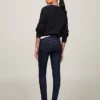 Jeans skinny a vita media con lavaggio scuro