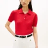 Maglia polo a trama traforata con logo bandiera su tutta la superficie Maglia polo a trama traforata con logo bandiera su tutta la superficie