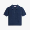Maglia polo a trama traforata con logo bandiera su tutta la superficie Maglia polo a trama traforata con logo bandiera su tutta la superficie