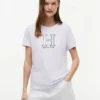 Maglietta con logo H floreale Maglietta con logo H floreale