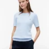 Maglione a maniche corte con lavorazione a trecce Maglione a maniche corte con lavorazione a trecce