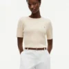 Maglione a maniche corte con lavorazione a trecce Maglione a maniche corte con lavorazione a trecce