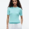 Maglione a maniche corte con lavorazione a trecce Maglione a maniche corte con lavorazione a trecce