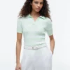 Maglione a righe con lavorazione a trecce Maglione a righe con lavorazione a trecce