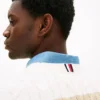 Maglione a righe con lavorazione a trecce Maglione a righe con lavorazione a trecce